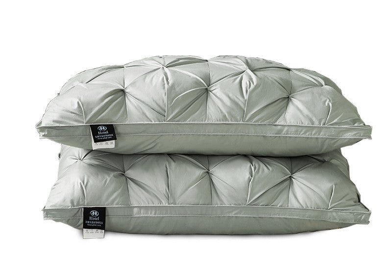 A Pair Of Feather Pillows And White Goose Single Neck Guards