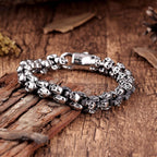 Bold Men’s Biker Bracelet – Double Link Chains Embellished with Rows of Death’s Skull in a Polished Silver Finish – Made of Rust & Discoloration Resistant Stainless Steel – Jewelry Gift for Men