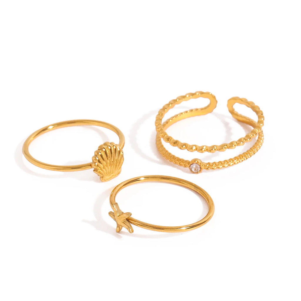 Juego de 3 anillos apilables elegantes para mujer de acero inoxidable chapados en oro de 18K con concha acanalada inspirada en el océano, estrella de mar y redondo