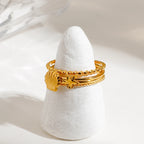 Juego de 3 anillos apilables elegantes para mujer de acero inoxidable chapados en oro de 18K con concha acanalada inspirada en el océano, estrella de mar y redondo