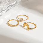 Juego de 3 anillos apilables elegantes para damas, chapados en oro de 18K, de acero inoxidable, con sol acanalado, piedra de imitación en forma de lágrima y piedra de imitación Rhines