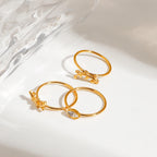 Set di 3 Anelli Impilabili Eleganti da Donna in Acciaio Inossidabile Placcato Oro 18K con Strass Scintillanti e Delicato Design a Foglia