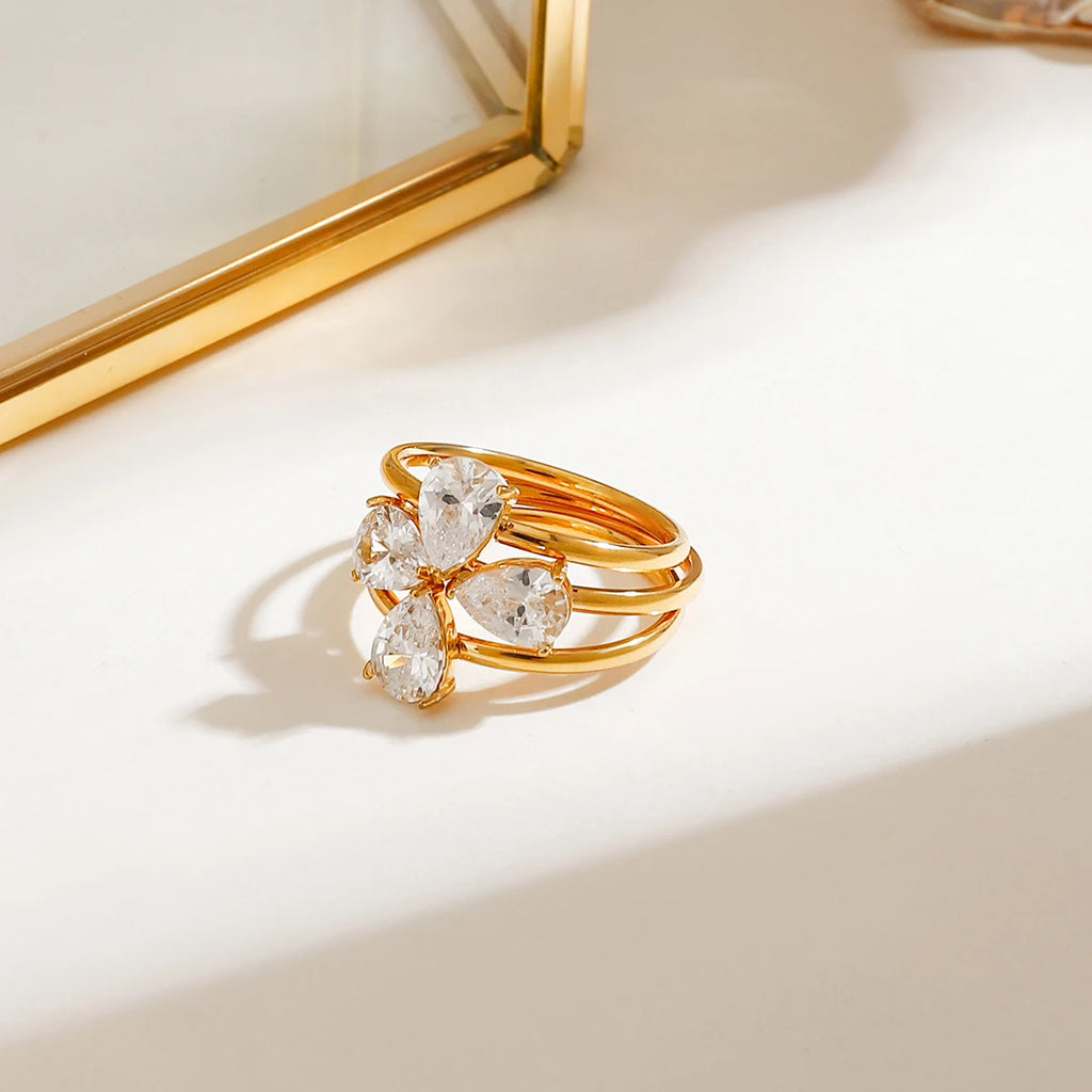 Zora Set de 3 Piezas Anillos Apilables Ajustables de Trébol Acero Inoxidable Chapado en Oro 18K Gota de Zirconia Brillante Joyería de Regalo de Lujo