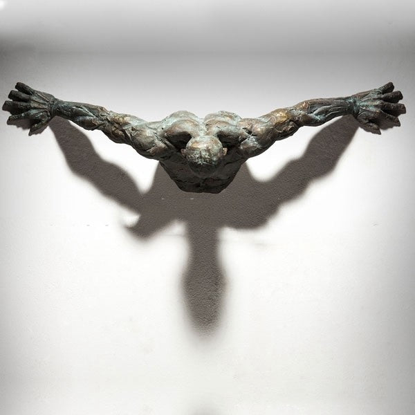 Artistic Sculpture Of Abstract Wall-penetrating Figures Imitating Copper - Grand Goldman