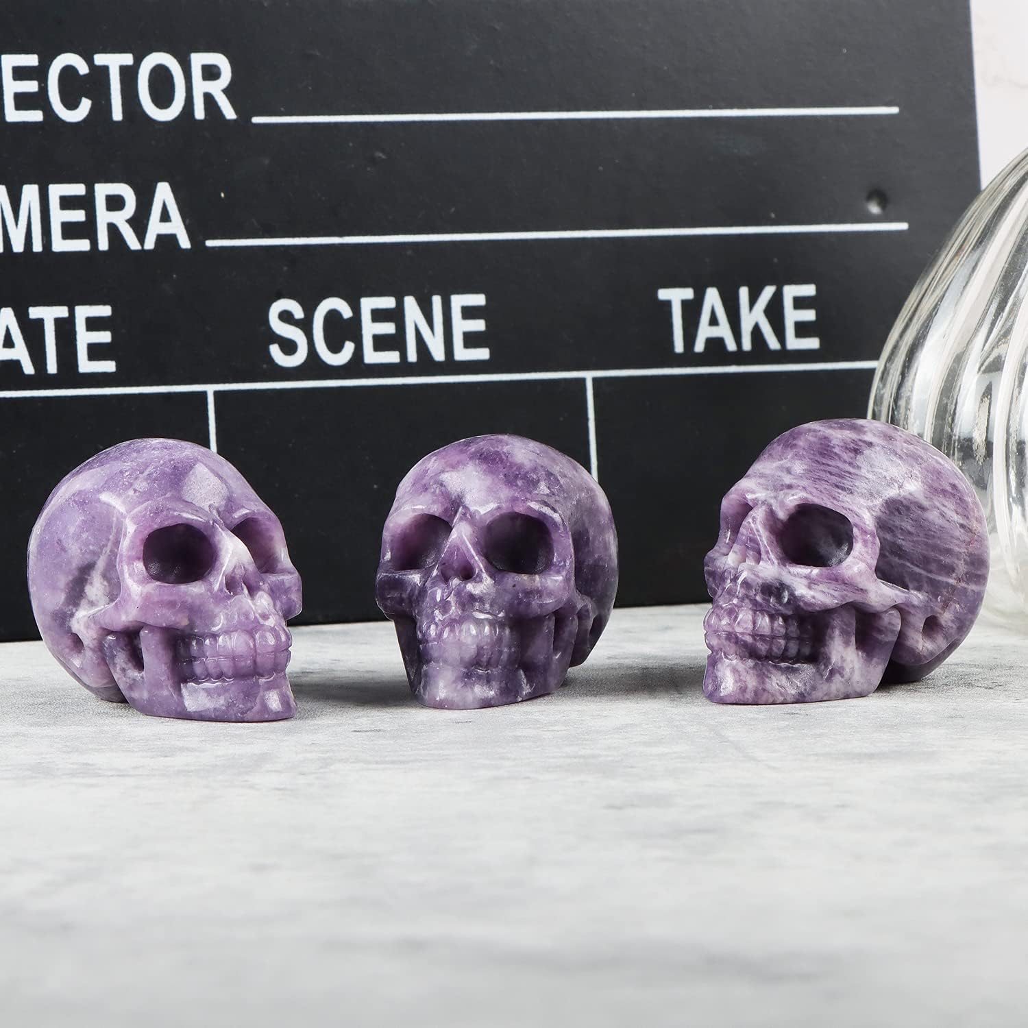 Artistone 2" Crystal Human Skull Head Decor Statue Carved Gemstone Purple Lepidolite Skeleton Head Art Figurines Reiki Healing Stone for Halloween Christmas Ornaments Home Office Decoration - Grand Goldman