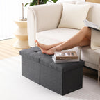 CUYOCA Storage Ottoman Bench Foldable Seat Footrest Shoe Bench End of Bed Storage with Flipping Lid, 75L Storage Space, 30 inches Linen Fabric Black - Grand Goldman