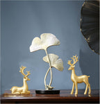 FANTESTICRYAN Small Reindeer Sculpture Resin Christmas Reindeer Elk 2pcs Christmas Home Decor Statues for Living Room, Bedroom, Office Desktop, Cabinets (Golden Small) - Grand Goldman