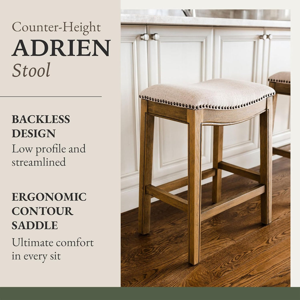 Maven Lane Adrien 26 Inch Counter Height Upholstered Backless Saddle Barstool in Natural Wood Finish with Wheat Cream Fabric Cushion Seat - Grand Goldman