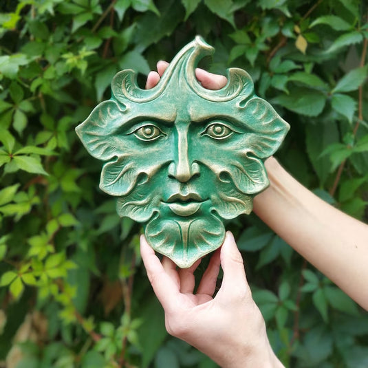 Pendentif statue rétro européenne avec visage de feuilles