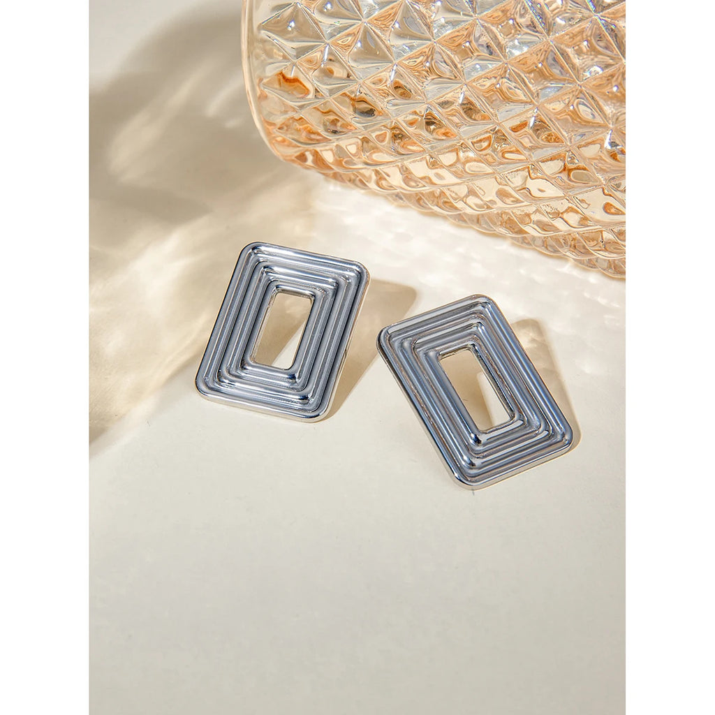 Rektangulært udhulet design Stålfarve Cyclotron Lines Øreringe Metaltekstur Rustfrit stål Stilfulde smykker af høj kvalitet