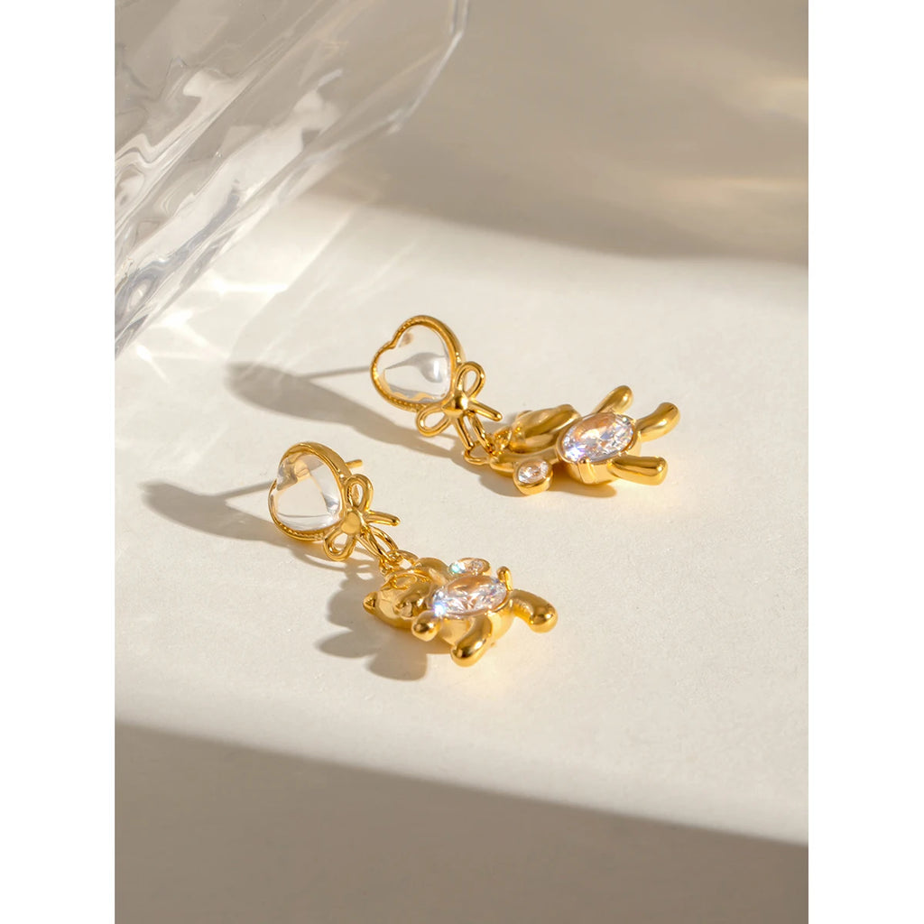 18K vergoldeter Edelstahl Weißer Katzenauge-Stein Runde Zirkon Panda Ohrringe Damen Metall Wasserdicht Modischer Charme Schmuck