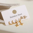 3 par pr. kort rustfrit stål hvid zirkon firespidsede stjerne øreringe 18K PVD belagte anti-allergiske rustsikre smykker