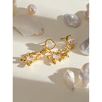 18K vergoldeter Edelstahl Weißer Katzenauge-Stein Runde Zirkon Panda Ohrringe Damen Metall Wasserdicht Modischer Charme Schmuck