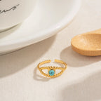 Bague Femme Personnalité Résistante à l'Eau Incrustation Turquoise Travail Ajouré Plaqué Or 18K Acier Inoxydable Design Œil du Diable Cadeau Délicat
