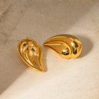 Vandtætte 18k forgyldte rustfrit stål splejsning kærlighed hjerte/vanddråbe øreringe Stilfulde anti-allergiske karakteristiske smykker