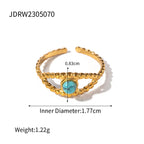 Bague Femme Personnalité Résistante à l'Eau Incrustation Turquoise Travail Ajouré Plaqué Or 18K Acier Inoxydable Design Œil du Diable Cadeau Délicat