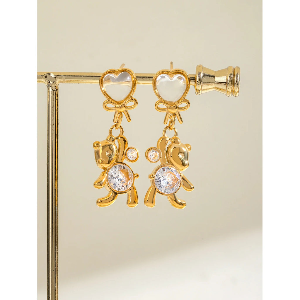 18K vergoldeter Edelstahl Weißer Katzenauge-Stein Runde Zirkon Panda Ohrringe Damen Metall Wasserdicht Modischer Charme Schmuck