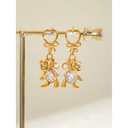 18K vergoldeter Edelstahl Weißer Katzenauge-Stein Runde Zirkon Panda Ohrringe Damen Metall Wasserdicht Modischer Charme Schmuck