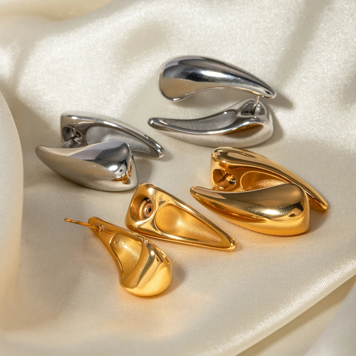 Geometrische wasserdichte 18k vergoldete Edelstahl-Ohrringe mit ineinander verschlungenen Wassertropfen, Charme, Statement, antiallergischem Schmuck