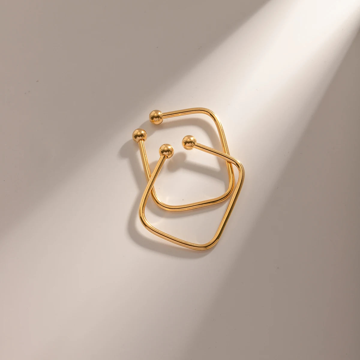 Rustfrit stål Elegant Minimalistisk Coil Dobbeltkugleøreclips 18K guld PVD-belagt Damer Metaltekstur Udsøgt Bijoux Femme Gave