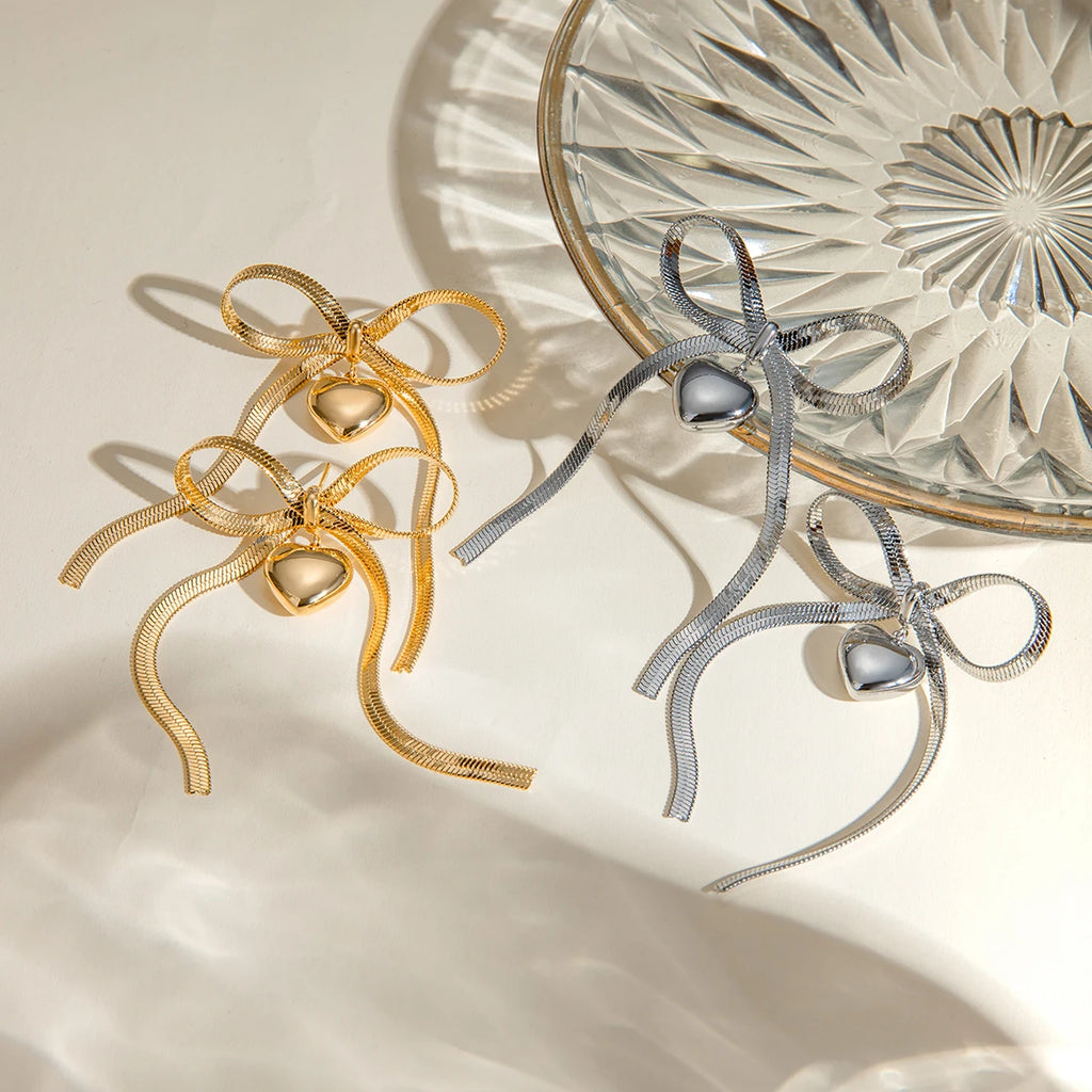 Catena a serpente in acciaio inossidabile placcato oro 18K orecchino pendente piatto a forma di cuore con fiocco amore gioielli romantici resistenti all'ossidazione regalo per gala