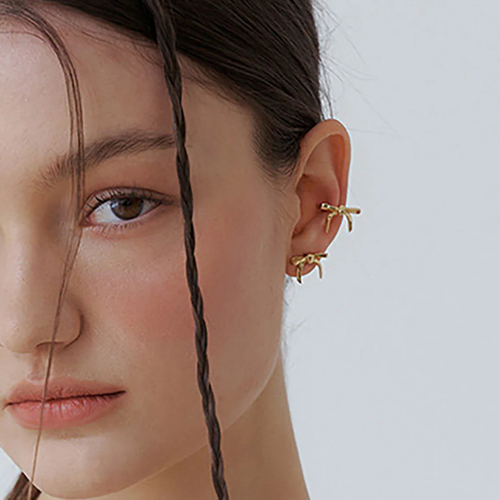 Minimaliste plaqué or 18 carats léger confortable clip d'oreille en forme de nœud papillon osseux pour femmes charme acier inoxydable étanche bijoux individualistes