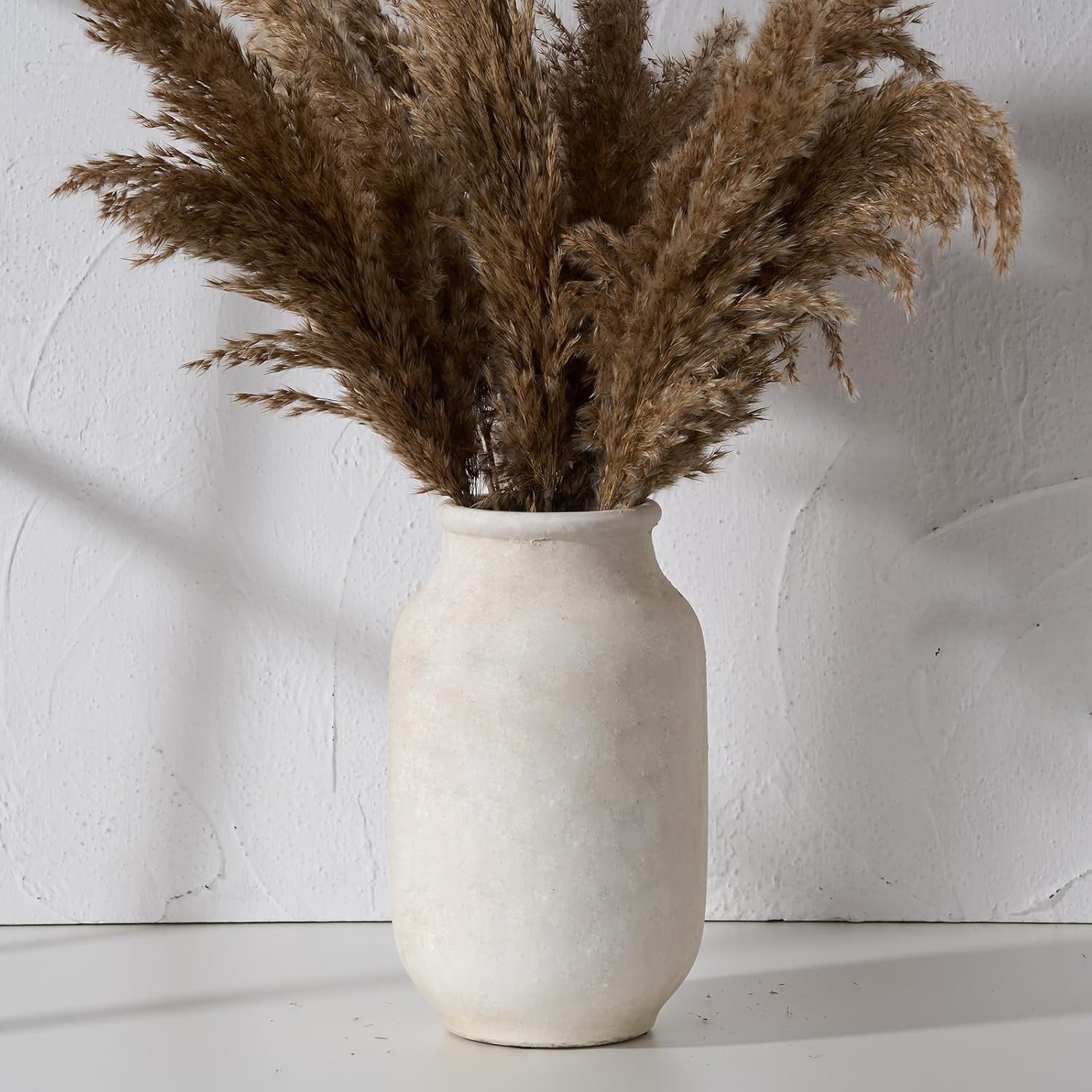 SIDUCAL Ceramic Rustic Farmhouse Vase | 7.3 Inch Pottery Decorative Flower Vase for Home Decor | Sand Glaze Finish Boho Vase for Table, Living Room, Bathroom Decoration, Shelf Decor, Mantel, White - Grand Goldman