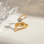 Gold-Silber-Farbabstimmung Unregelmäßiger Hohlstahlkugelring 18K PVD-beschichtet Damen Anti-Allergie Metallanhänger Täglicher Schmuck