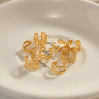 Clips de oreja de acero inoxidable con diseño irregular casual de primavera para mujer Pendientes trenzados minimalistas Joyería impermeable Regalo