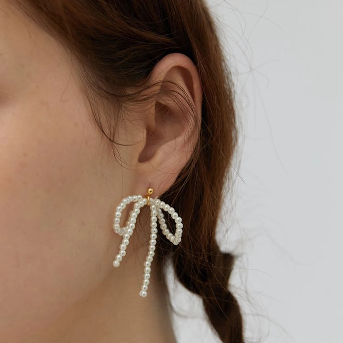 18K Vintage Edelstahl Minimalistische Sommer-Elemente Perlen Schleifenohrringe Damenmode Attraktiver Schmuck Gala Geschenk