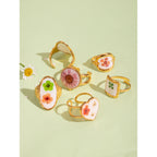 Leichter, gemütlicher, 18k vergoldeter minimalistischer weißer Tropfen-Öl getrockneter Blumen-Open-End-Ring für Frauen aus Edelstahl Statement-Schmuck