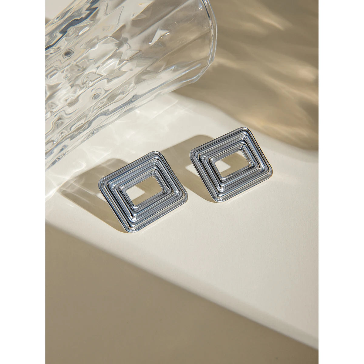 Rektangulært udhulet design Stålfarve Cyclotron Lines Øreringe Metaltekstur Rustfrit stål Stilfulde smykker af høj kvalitet