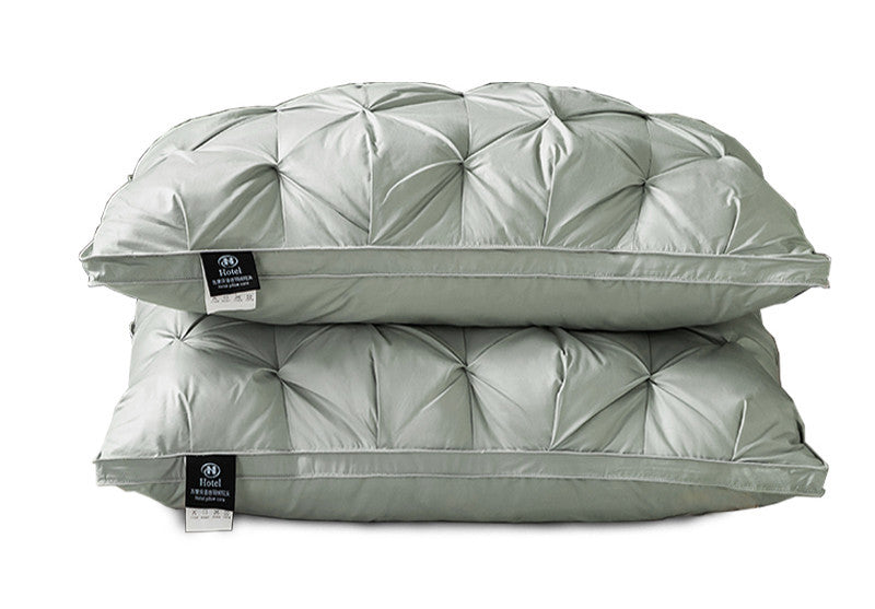 A Pair Of Feather Pillows And White Goose Single Neck Guards