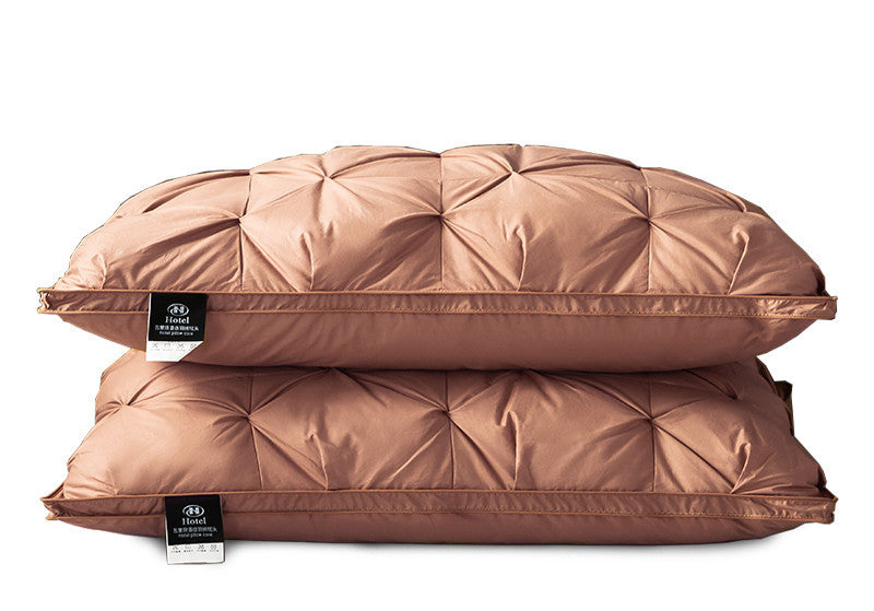 A Pair Of Feather Pillows And White Goose Single Neck Guards